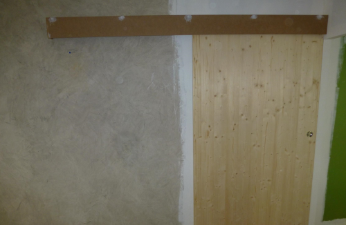 Installation de porte coulissante en rénovation Villemoustaussou